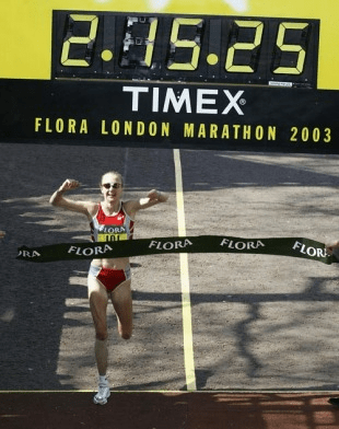 Paula Radcliffe crossing the finish line of the Flora London Marathon in 2003
